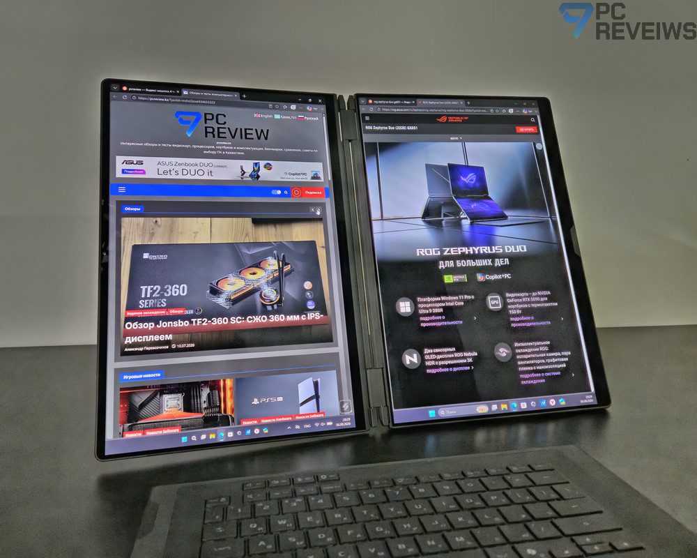 ASUS ROG Zephyrus Duo 2026 с разными окнами и приложениями, одновременно выведенными на два OLED-экрана.